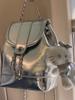 2024 Nueva mochila plateada estilo Chanel para mujer, bolsa de nicho de Corea del Sur, para blogueros de Instagram, mochila pequeña portátil para viajes