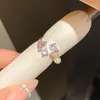 Anel Aberto Peixe Pequeno com Gotejamento de Óleo de Zircônia e Pérola Anel para Dedo Indicador com Sensação de Nicho de Alto Padrão Design de Luxo Leve Joia de Mão da Moda para Mulheres