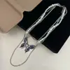 Collar de Perlas de Múltiples Capas con Colgante de Mariposa Azul y Morado Súper Hada Elegante para Mujer Cadena para Clavícula Dulce de Nicho con Temperamento de Dama