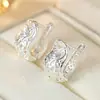 Brincos florais vazados estilo palácio retrô, leves e luxuosos, com prata brilhante e padrões florais em espiral, brincos estilo étnico, atacado