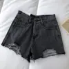 Shorts de mezclilla rotos para mujer verano 2022 Nuevos holgados pierna ancha línea A pantalones versátiles adelgazantes deshilachados hot pants moda ins