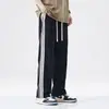 Calça Retro Americana para Homens Outono e Inverno 2026 High Street Fluida Tendência Listrada de Perna Reta Esportiva Casual Longa para Homens