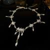 Collar de borla con lazo de perlas incrustadas de diamantes, estilo europeo y americano, ligero y de lujo, cadena de clavícula de moda, collar de nicho de alta calidad.