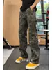 Pantalones de camuflaje estilo retro americano, ligeramente acampanados, para hombre, colección primavera/verano, con corte inclinado, diseño de pierna recta y un aire de ropa de trabajo inspirado en leñador, parecidos a jeans de mezclilla curvados