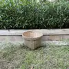 Cestas e pás de bambu, finamente tecidas à mão, usadas para armazenar grãos, para plantações de chá rurais, para colheita e secagem, e para uso festivo em novas casas