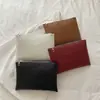 Bolso de trabajo para el día a día de color liso 2026 PU con patrón tejido de color liso moderno con textura casual, clutch tipo sobre de gran capacidad