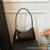 Bolso de axila de diseño exclusivo con sensación de alta gama, Bolso de hombro casual para mujer, Bolso cruzado versátil y de moda para 2026, Transfronterizo
