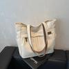 Bolsa Casual de Tecido para Pedidos Internacionais para Mulheres 2026 Nova Versátil Bolsa para Estudantes Universitários Aula Grande Capacidade Bolsa Tote de Ombro para o Dia a Dia