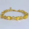 Pulsera de trébol de cuatro hojas de venta caliente, elegante, fresca, cristal amarillo, diamante amarillo, europea y americana, imitación de turmalina amarilla, pulsera de flores