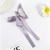 Pinza para el pelo de estilo nuevo transfronteriza, exquisita, estilo dulce, con lazo de cinta, sensación elegante y de alta gama, elegante pinza de tiburón para mujer
