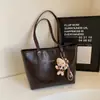 2026 Bolso Tote Nuevo Más Vendido para Mujer, Viaje al Trabajo, Gran Capacidad, Un Hombro, Elegante, de Mano, Simple, Rígido, Tridimensional