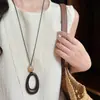 Nuevo Collar con Colgante de Estilo Étnico Chino para Mujer 2025 Nuevo Diseño de Nicho Cadena Larga para Suéter de Gama Alta