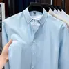 Camisa de Hombre 100% Algodón Puro Primavera y Otoño Nuevo Textil Oxford Lavado Rayas Verticales Top Casual Camisa de Manga Larga para Hombre