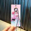 Chaveiro de Gato de Desenho Animado para Carro Pingente de Flor Colorida para Celular Presente de Corda Trançada para Meninas Pingente de Pequena Sacola de Presente Venda por Atacado