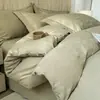 Conjunto de quatro peças de algodão escovado jacquard em relevo tecido espesso de alta qualidade com capa de edredom de borda larga, lençol de cima, lençol com elástico, conjunto de três peças de algodão puro espessado