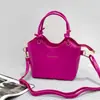 Nuevo bolso tipo cubo de cuero, con una textura suave de cuero PU, versátil bolso cruzado o de hombro, con un asa de cuerda de algodón anudada, un bolso de mano único y elegante para mujer