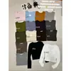 Yuanxi-2026 Otoño Estilo Minimalista Coreano Versátil Ajustado Suéter Corto Camiseta de Manga Larga Cuello en V 26833