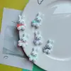 Coelho Fofo Sentado de Desenho Animado Usando Cachecol Resina DIY Capa de Celular Elástico de Cabelo Acessório de Cabelo Fivela de Sapato Material Acessórios Atacado