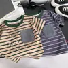 Conjunto de Ropa de Verano para Niños Manga Corta 2026 Nuevo Elegante Estilo Coreano para Niños Pequeños Bebé Bolsillo Conjunto de Dos Piezas Moderno