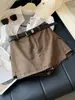Falda Pantalón de Mezclilla Retro de Cintura Alta Adelgazante para Mujer, Nueva Versátil Otoño 2026 Falda Corta de Línea A Anti-Exposición