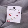 Juego de 3 pares de pendientes de estilo coreano para mujer, con diseño de cerezas, hojas de diamantes y muchas explosiones.