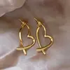 Pendientes de Corazón Metálico Cruzado de Alto Gama de Diseño de Nicho para Mujer con Pendiente de Plata 2025 Nuevos Pendientes Sencillos de Moda