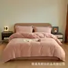 Juego de ropa de cama de felpa de alta gama para bebés de otoño e invierno en Nantong, grado A, adecuado para madres y bebés, con un juego de cuatro piezas hecho de tela suave de felpa de leche
