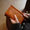 2025 Nuevo Cierre Automático Almacenamiento de Resorte Tesoro Portátil Mini Multifuncional Bolsa Pequeña para Artículos Varios Auriculares Llave
