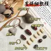Kit de material DIY para fazer um móbile de casca de fruta, um sino pendurado de cura, com frutas pretas indonésias, estramônio, lírio d'água e rotim