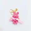 Celebridad de internet oso tejido pajarita conejo llavero marca de moda oso de lana muñeca de resina tridimensional colgante de mochila de coche