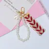 Llavero de Cinta de Hojas de Tela Fresca Colgante de Bolso de Mano con Cadena de Perlas para Niña Accesorios DIY Regalo