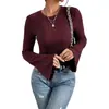 Nuevo top de punto acanalado cepillado de cuello redondo para mujer, de estilo europeo y americano, de manga larga, de moda, de venta caliente