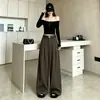Pantalones de lana de pierna ancha de alta gama para mujer, colección otoño 2026, de cintura alta, con caída fluida, estilo retro, versátiles, adelgazantes y pantalones casuales de pierna recta.