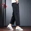 Pantalones de Hombre de Tejido Color Claro de Nueve Puntos Pierna Recta 2026 Verano Nuevo Estilo Sueltos Simples Versátiles para Exteriores y Viajes Rápidamente Secantes Casuales