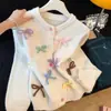 Cárdigan suéter 2026 primavera y otoño estilo nuevo tejido de punto color liso abrigo exterior top elegante con lazo diseño simple