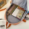Versión coreana mochila nueva mujer estudiante de preparatoria japonés simple estudiante de secundaria bolsa de doble hombro hombres estudiante de secundaria estudiante universitario mochila para computadora