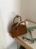 Bolsa de mão retrô em camurça para outono e inverno, bolsa estilo bowling niche coreana, bolsa Boston, bolsa de ombro versátil, bolsa pequena transversal para mulheres