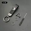 Llavero de coche con patrón de dibujos animados de marca creativa y moderna, colgante para motocicleta, correa de cuero y metal anti-pérdida, regalo
