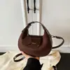 Bolso de mano pequeño redondo para mujer, colección otoño/invierno 2025, bolso de hombro moderno y a la moda, bolso tote simple y versátil