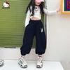 Pantalones de chándal para niña con colaboración de Kuromi Otoño 2026 Estilo Nuevo con Estampado de Corazón en los Puños, Venta al por Mayor para Niños Mayores