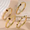 Pulsera Transfronteriza de Acero Inoxidable Europea y Americana Pulsera de Acero de Titanio Piedra Ojo de Tigre Pulsera de Pareja Simple Versátil Moderna Elegante Pulsera Abierta