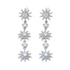 Conjunto de Joias: Brincos de Girassol Estrela de Oito Pontas com Franja, Pulseira de Girassol Cravejada com Zircônia Diamante de Luxo Leve, Moderno e de Alto Padrão