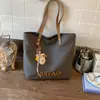 Bolso de Hombro Tote Retro de Nicho Nuevo para Mujer Primavera 2026, Adecuado para Viajes al Trabajo y Clases, Bolso de Mano de Lona de Gran Capacidad
