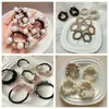 Yiwu Populares Gomas para el Cabello Artículos Pequeños Cuerdas para el Cabello Accesorios de Puesto Callejero Vendido por Libra Accesorios para el Cabello Gomas para el Cabello [Plan] Tipo sin Suelto
