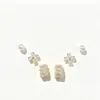 Conjunto de Brincos Curvos de Três Peças com Pérola e Zircônia, Estilo Novo, Transfronteiriço da Amazon para Mulheres, Brincos Modernos de Luxo Leve com um Temperamento Suave