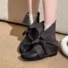Botines de tobillo de diseño de nicho nuevo y moderno estilo coreano, con cordones, puntera redonda, que aumentan la altura, botines western de puntera redonda, botas de moda