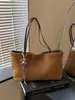 Bolso tote texturizado vintage de alta gama estilo coreano para mujer, nueva moda 2026, versátil, gran capacidad, para ir al trabajo, bajo el brazo