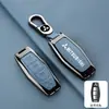 Adequado para novo conjunto de chaves Mitsubishi Outlander Jinxuan ASX Yi Ge Yi Shen Guang carro Pajero Jin Chang fivela de concha