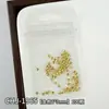 Decorações de arte para unhas com tema oceânico: Designs de estrelas-do-mar douradas e prateadas, conchas e coqueiros em estilo japonês, com apliques metálicos para unhas