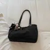 Bolso tote minimalista de estilo coreano con estampado de leopardo, nuevo para 2026, un bolso de hombro elegante y espacioso para el trabajo y los desplazamientos, también adecuado como bolso de axila